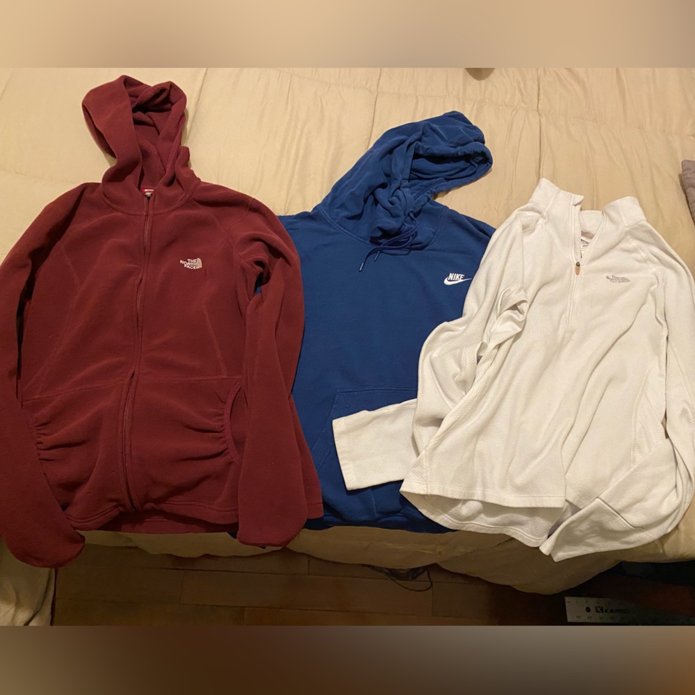 Three sweatshirts, women’s larges, Nike and north face